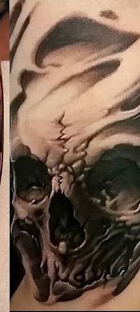 Tattoo von Xenomorph Tattoo: Schädel-Studie